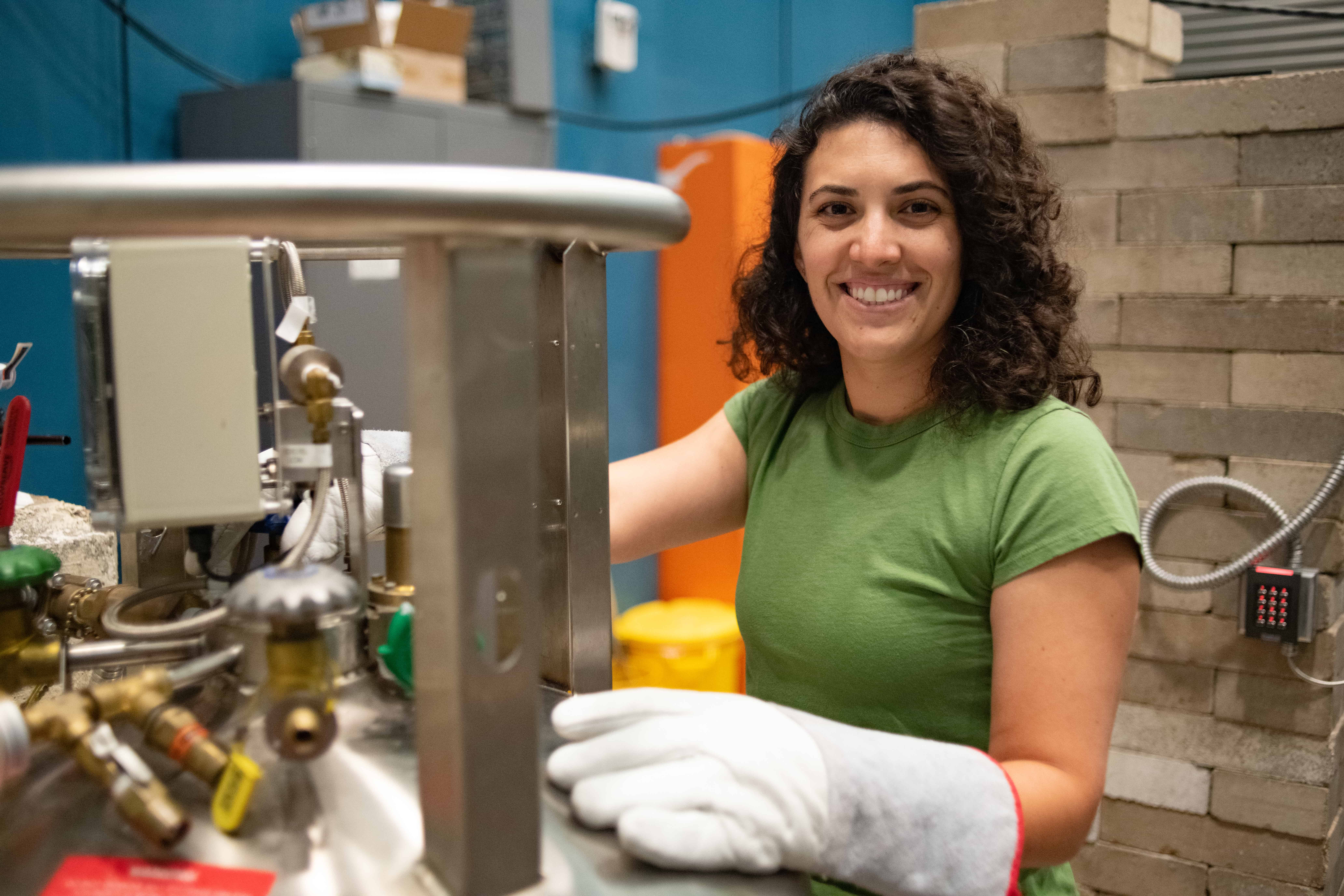 Photo of UT student working on a nuclear reactor.